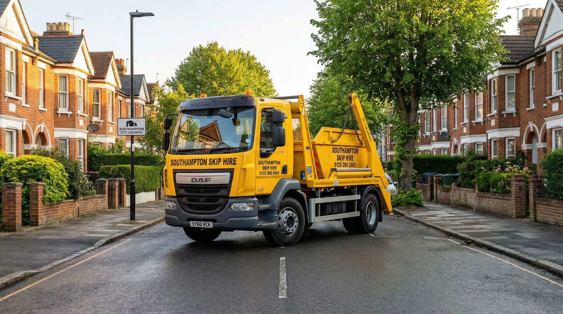 Southampton Skip Hire lorry delivering a skip